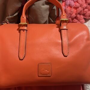 Dooney & Bourke Salmon colored Olivia bag. Florentine leather